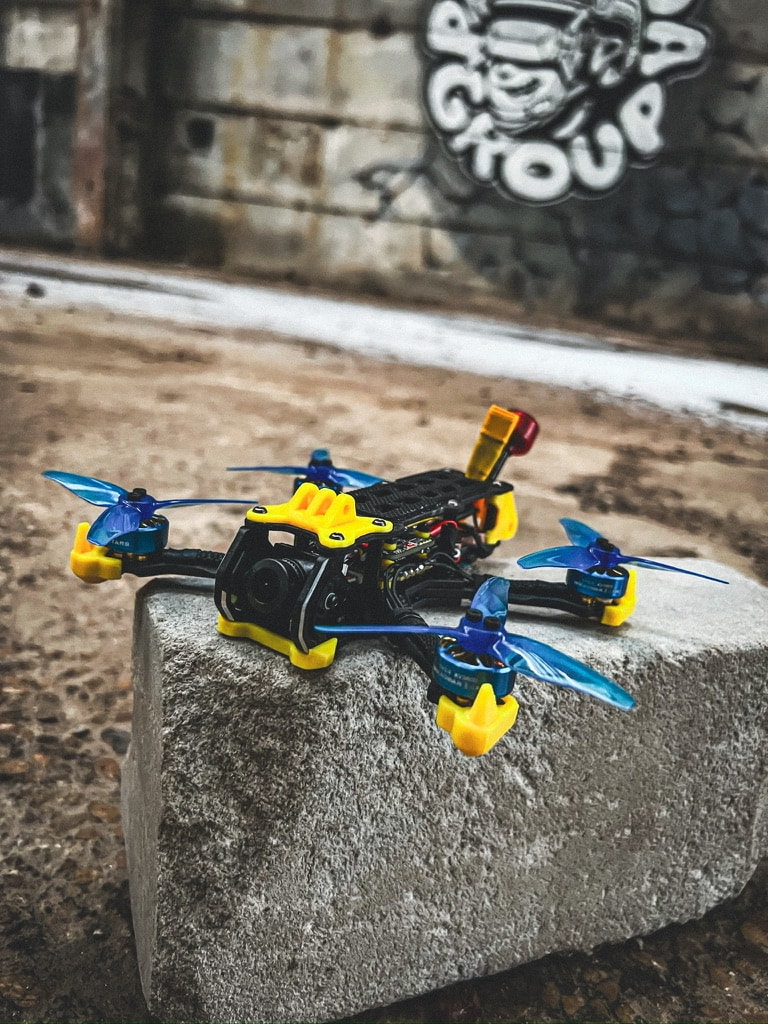 Volador 3-inch FPV drone built for Killhouse Academy, featuring SpeedyBee Mini stack, TX800 VTX, and yellow-blue patriotic 3D printed parts from Norial FPV.