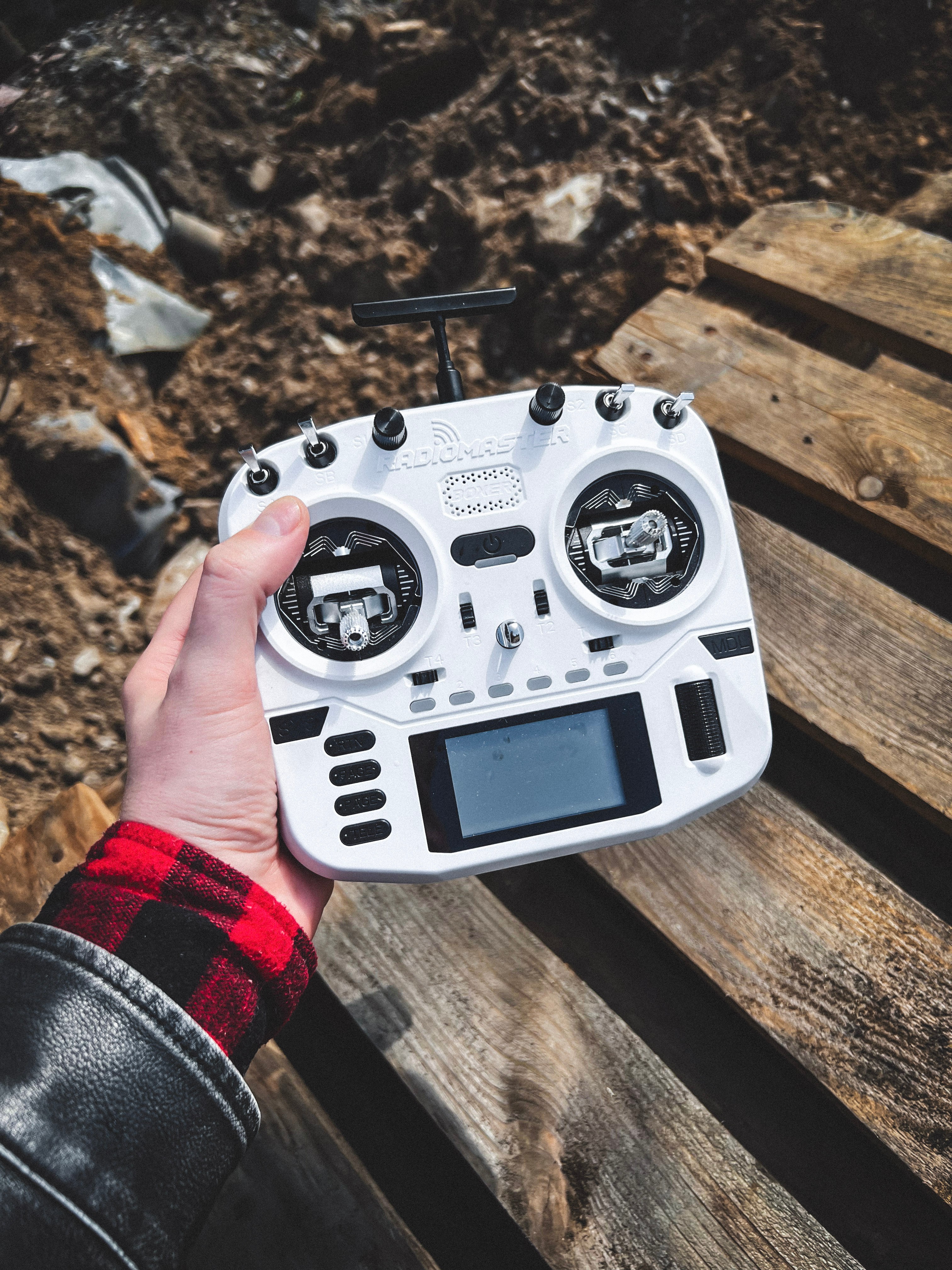 Boxer Crush FPV remote in white with custom LED rings, favorite transmitter for freestyle and cinematic drone flying.